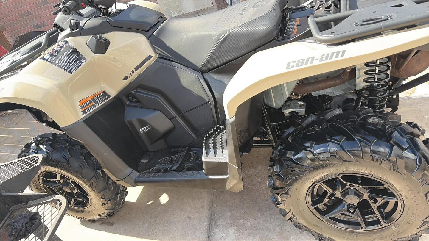 Can-Am Outlander cleaned down to the suspension and tires